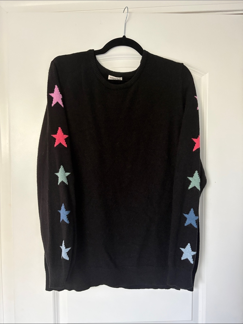 Sugarhill Brighton Black Knit Sweater with Star sleeves